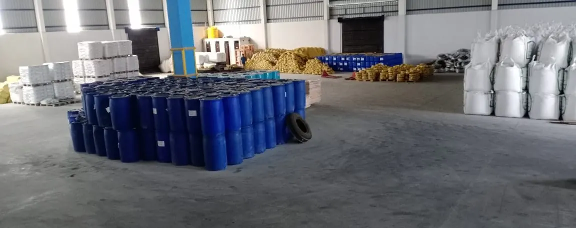 Drums, jumbo bags and sacks stored in marked rows